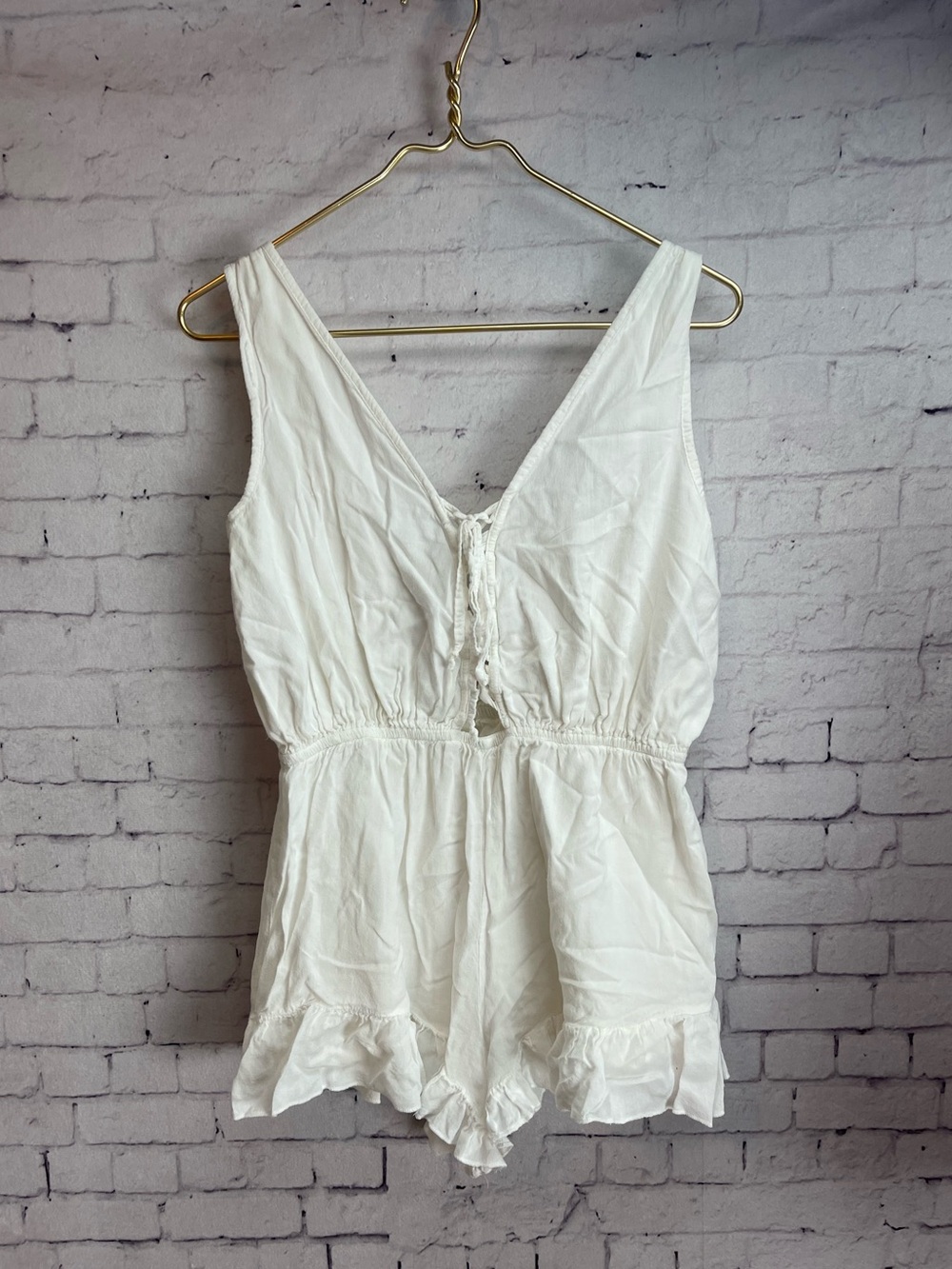 ANGL size medium white lace up short romper